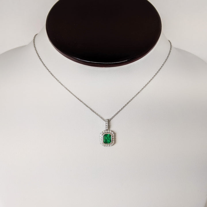 14K WHITE EMERALD .91 CARAT TOTAL EMERALD CUT BEZEL WITH .18 DIAMOND TOTAL WEIGHT ESTATE PENDANT & CHAIN 2.8 GRAMS