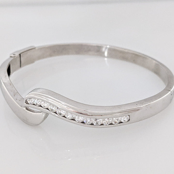 18K WHITE .72 CARAT TOTAL WIEGHT SI1 H DIAMOND ROUND (12) BYPASS CHANNEL SET ESTATE BANGLE 15.3 GRAMS