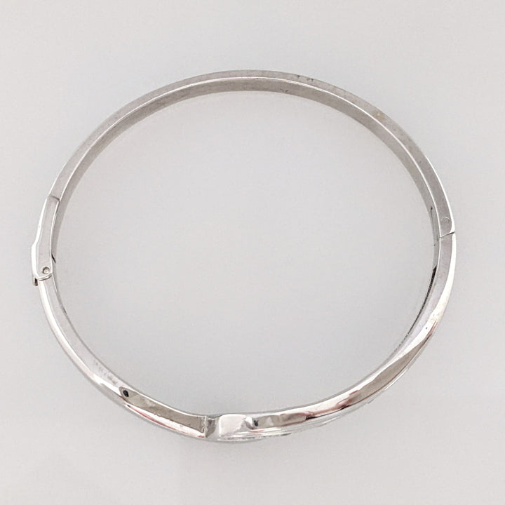18K WHITE .72 CARAT TOTAL WIEGHT SI1 H DIAMOND ROUND (12) BYPASS CHANNEL SET ESTATE BANGLE 15.3 GRAMS