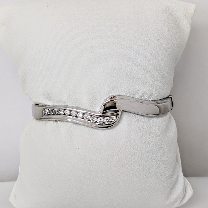 18K WHITE .72 CARAT TOTAL WIEGHT SI1 H DIAMOND ROUND (12) BYPASS CHANNEL SET ESTATE BANGLE 15.3 GRAMS