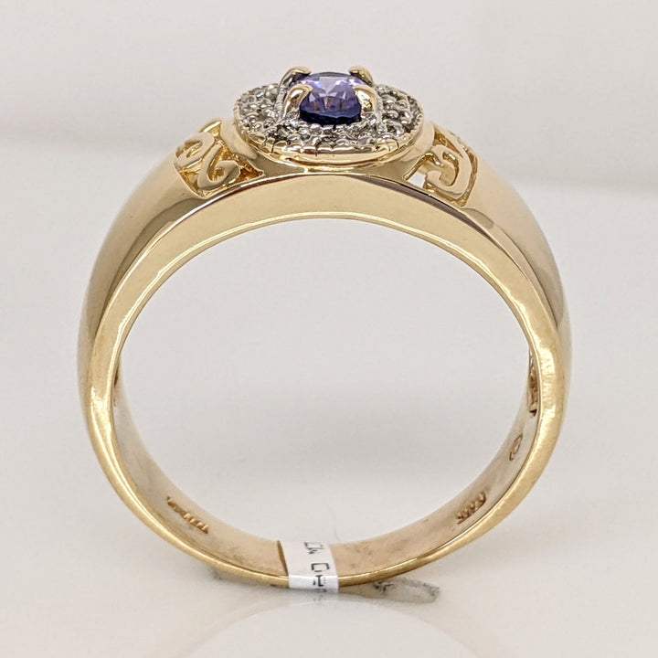 14K TANZANITE OVAL 3X5 WITH .12 DIAMOND TOTAL WEIGHT (12) ESTATE RING 5.5 GRAMS