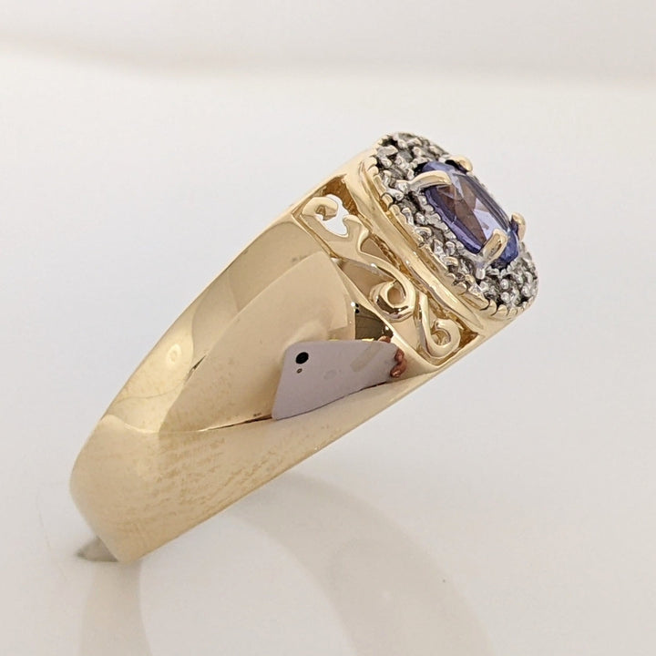 14K TANZANITE OVAL 3X5 WITH .12 DIAMOND TOTAL WEIGHT (12) ESTATE RING 5.5 GRAMS