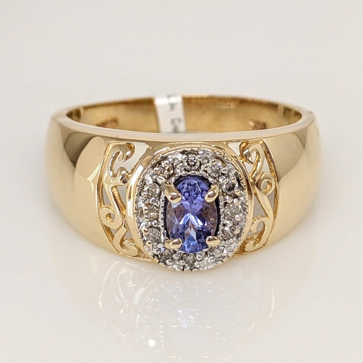 14K TANZANITE OVAL 3X5 WITH .12 DIAMOND TOTAL WEIGHT (12) ESTATE RING 5.5 GRAMS