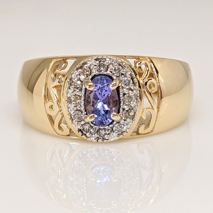 14K TANZANITE OVAL 3X5 WITH .12 DIAMOND TOTAL WEIGHT (12) ESTATE RING 5.5 GRAMS