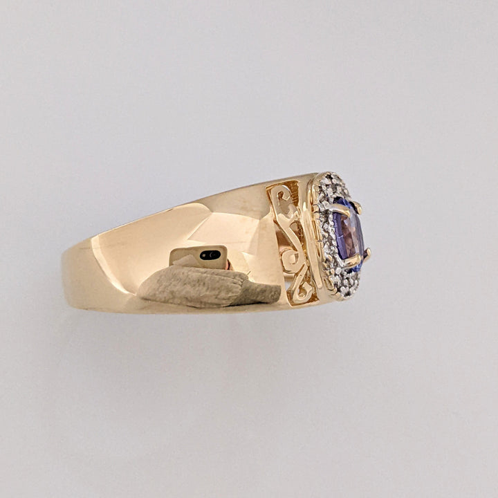 14K TANZANITE OVAL 3X5 WITH .12 DIAMOND TOTAL WEIGHT (12) ESTATE RING 5.5 GRAMS