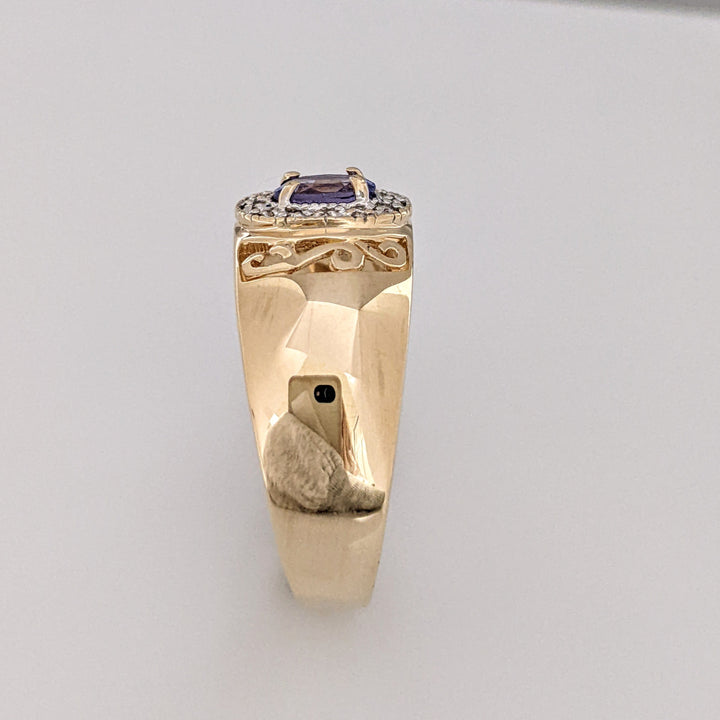 14K TANZANITE OVAL 3X5 WITH .12 DIAMOND TOTAL WEIGHT (12) ESTATE RING 5.5 GRAMS