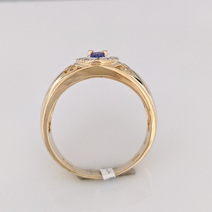 14K TANZANITE OVAL 3X5 WITH .12 DIAMOND TOTAL WEIGHT (12) ESTATE RING 5.5 GRAMS