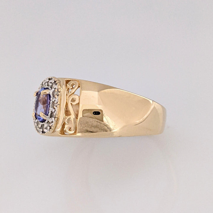 14K TANZANITE OVAL 3X5 WITH .12 DIAMOND TOTAL WEIGHT (12) ESTATE RING 5.5 GRAMS