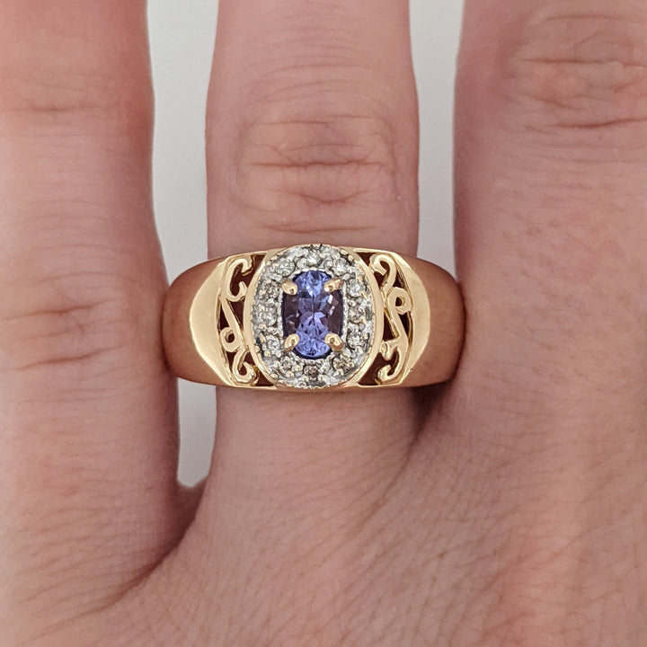 14K TANZANITE OVAL 3X5 WITH .12 DIAMOND TOTAL WEIGHT (12) ESTATE RING 5.5 GRAMS