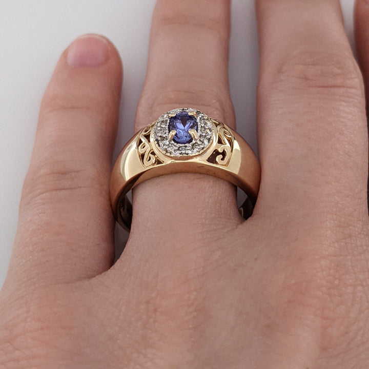 14K TANZANITE OVAL 3X5 WITH .12 DIAMOND TOTAL WEIGHT (12) ESTATE RING 5.5 GRAMS