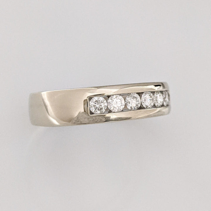 14K WHITE .62 CARAT TOTAL WEIGHT I1 I DIAMOND ROUND (7) ESTATE "LEO" CHANNEL-SET BAND 8.8 GRAMS