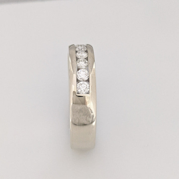 14K WHITE .62 CARAT TOTAL WEIGHT I1 I DIAMOND ROUND (7) ESTATE "LEO" CHANNEL-SET BAND 8.8 GRAMS