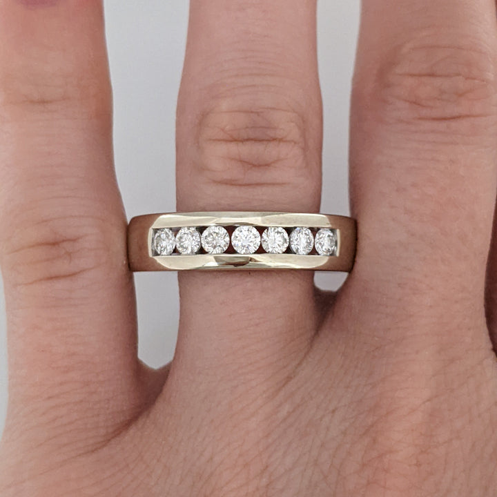 14K WHITE .62 CARAT TOTAL WEIGHT I1 I DIAMOND ROUND (7) ESTATE "LEO" CHANNEL-SET BAND 8.8 GRAMS