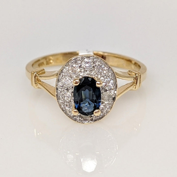 14K SAPPHIRE OVAL 4X6 WITH .15 DIAMOND TOTAL WEIGHT SPLIT SHANK ESTATE RING 2.2 GRAMS