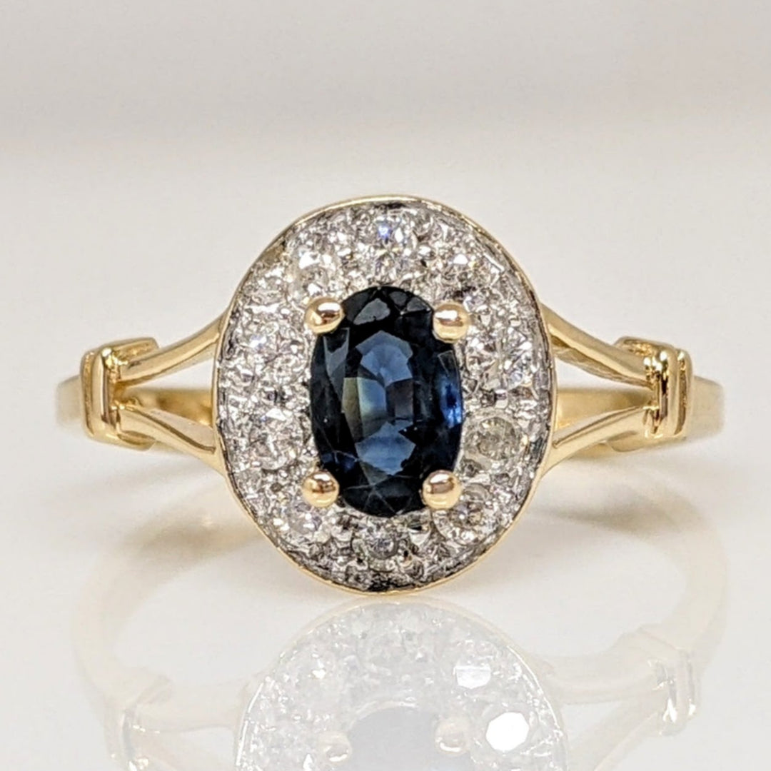14K SAPPHIRE OVAL 4X6 WITH .15 DIAMOND TOTAL WEIGHT SPLIT SHANK ESTATE RING 2.2 GRAMS