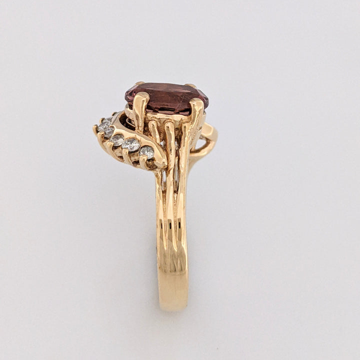 10K RASPBERRY TOURMALINE OVAL 8X10 WITH .50 DIAMOND TOTAL WEIGHT ESTATE RING 5.8 GRAMS