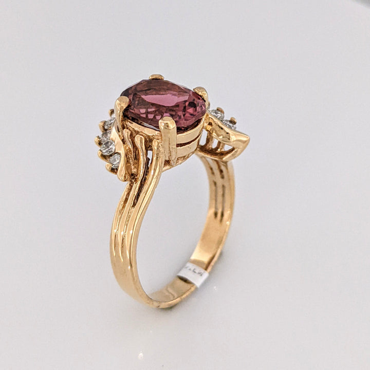 10K RASPBERRY TOURMALINE OVAL 8X10 WITH .50 DIAMOND TOTAL WEIGHT ESTATE RING 5.8 GRAMS