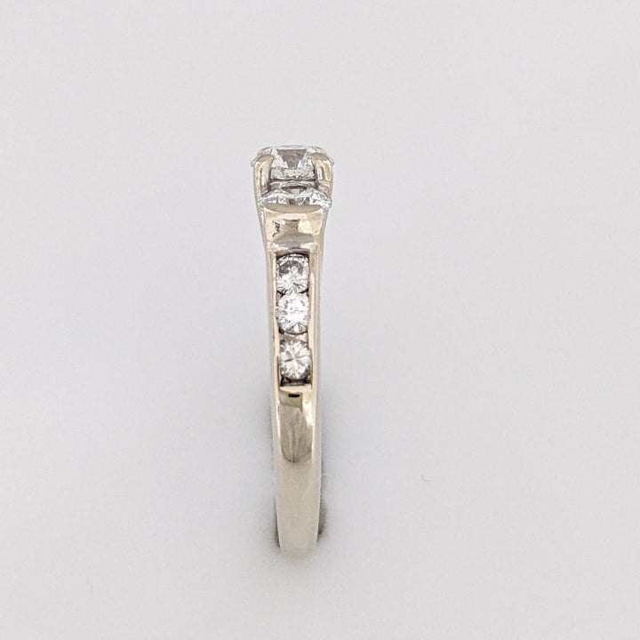 14K WHITE .83 CARAT TOTAL WEIGHT I1 H DIAMOND ROUND (9) ESTATE TRINITY RING 2.7 GRAMS