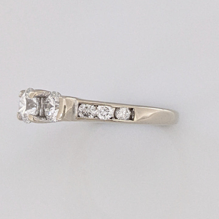 14K WHITE .83 CARAT TOTAL WEIGHT I1 H DIAMOND ROUND (9) ESTATE TRINITY RING 2.7 GRAMS