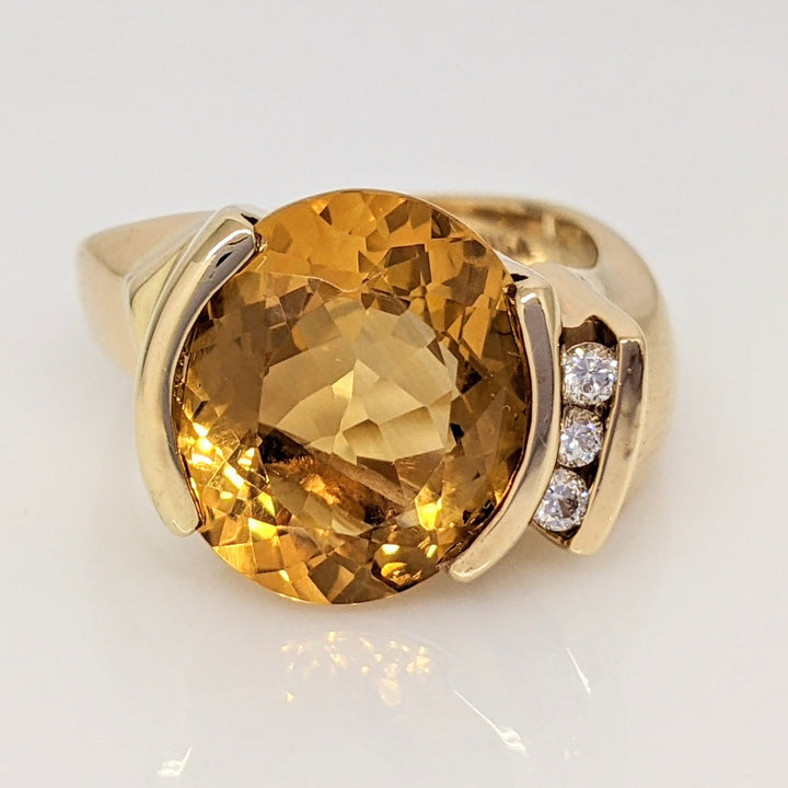 14K CITRINE OVAL 12X14 WITH .10 DIAMOND TOTAL WEIGHT (3) ROUND ESTATE RING 11.6 GRAMS
