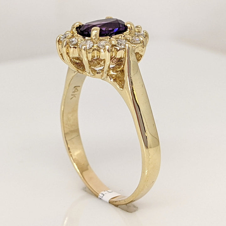 14K AMETHYST OVAL 5X7 WITH .24 DIAMOND TOTAL WEIGHT (12) ESTATE RING 4.6 GRAMS