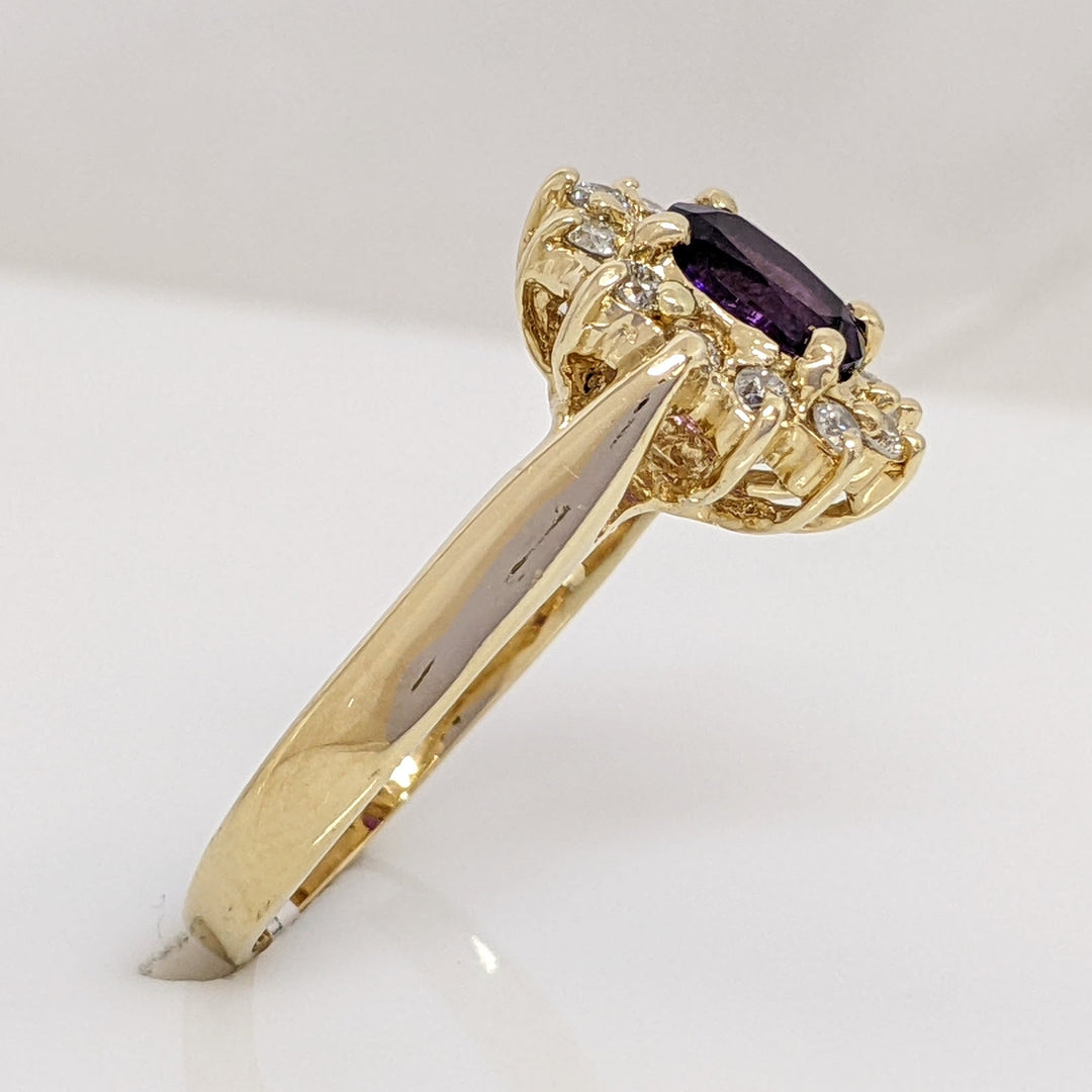 14K AMETHYST OVAL 5X7 WITH .24 DIAMOND TOTAL WEIGHT (12) ESTATE RING 4.6 GRAMS