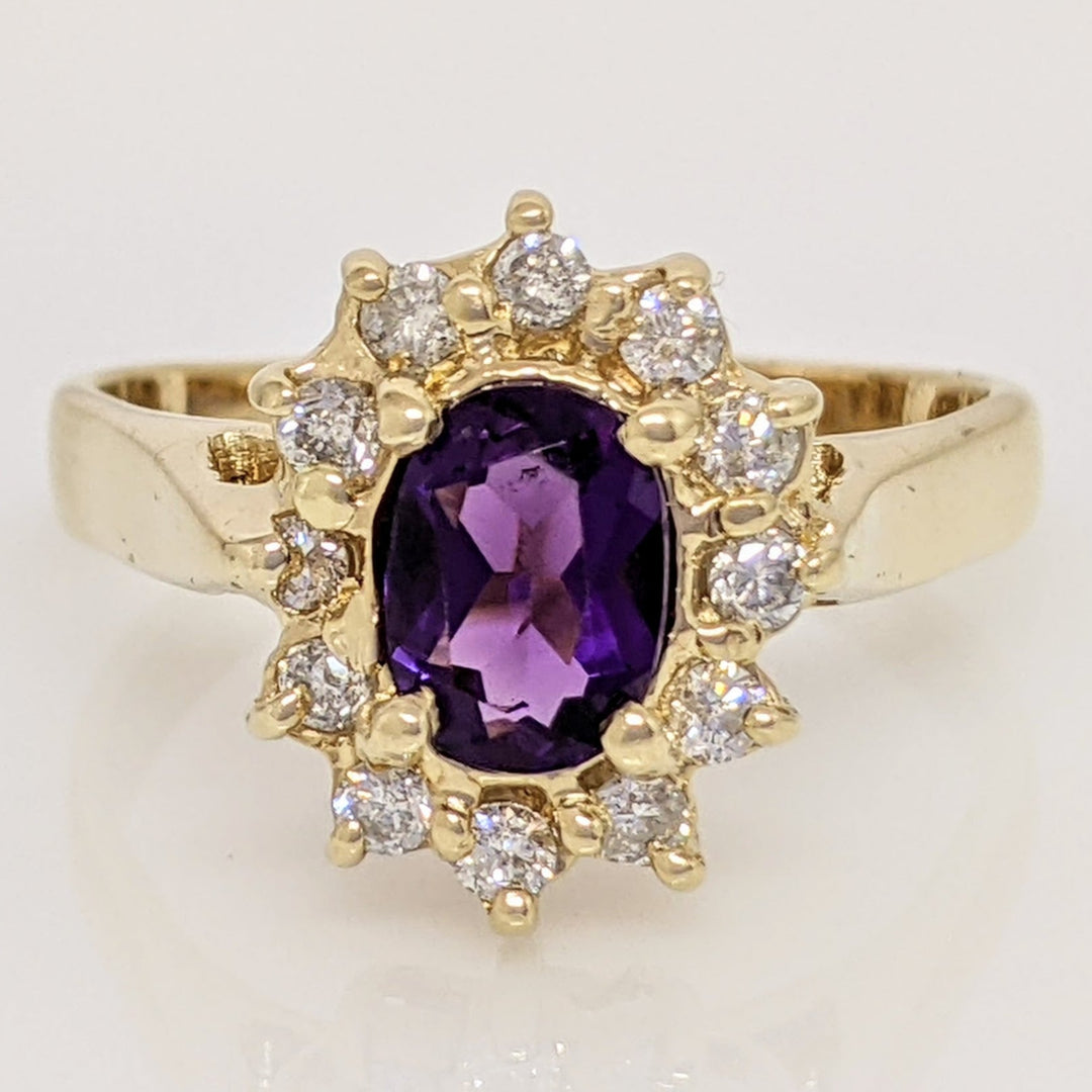 14K AMETHYST OVAL 5X7 WITH .24 DIAMOND TOTAL WEIGHT (12) ESTATE RING 4.6 GRAMS