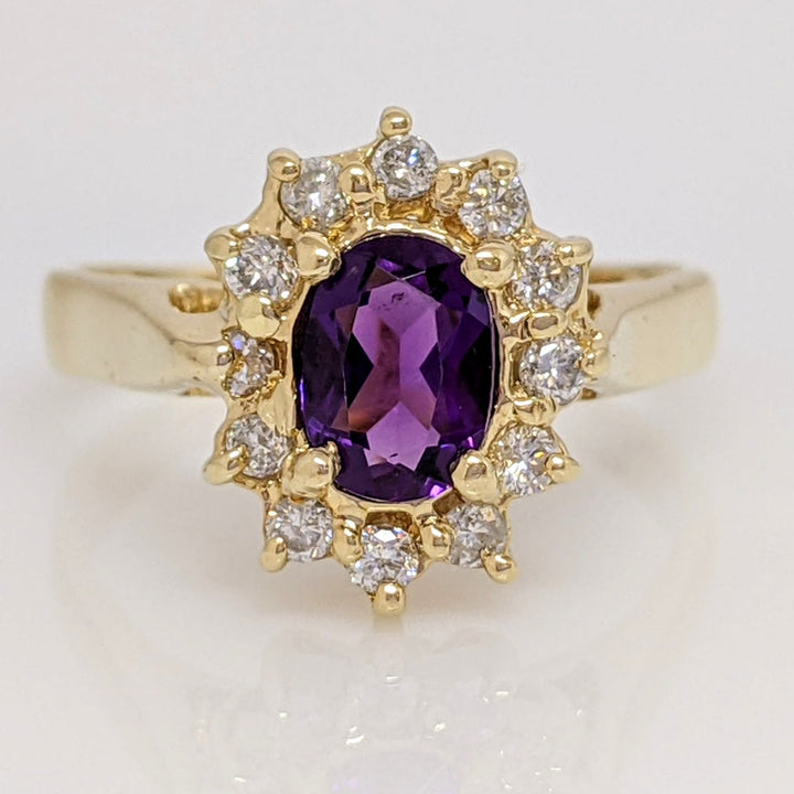14K AMETHYST OVAL 5X7 WITH .24 DIAMOND TOTAL WEIGHT (12) ESTATE RING 4.6 GRAMS