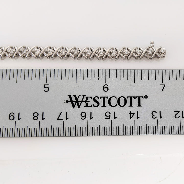 14K WHITE 1.28 CARAT TOTAL WEIGHT I1 I DIAMOND ROUND (32) "X" LINK ESTATE BRACELET 15.1 GRAMS