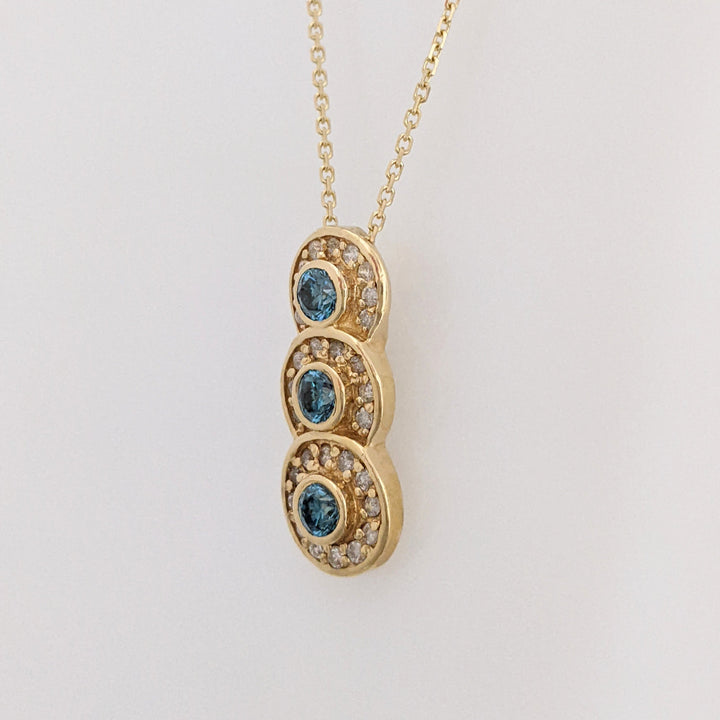 14K .65 CARAT TOTAL WEIGHT I1-I2 BLUE (3) WHITE (29) BEZEL ESTATE PENDANT & CHAIN 3.6 GRAMS