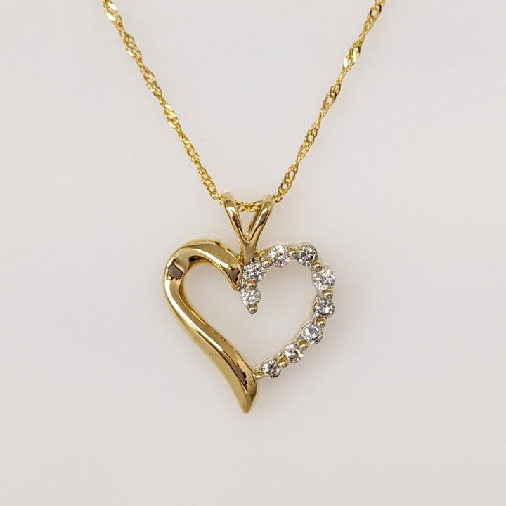 14K .27 CARAT TOTAL WEIGHT I1 I DIAMOND ROUND (9) ESTATE HEART PENDANT & CHAIN 3.9 GRAMS