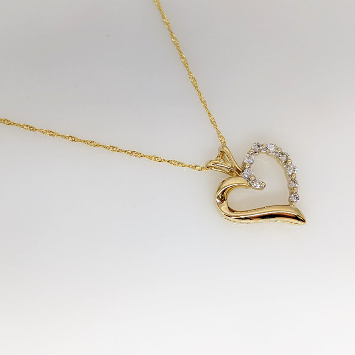 14K .27 CARAT TOTAL WEIGHT I1 I DIAMOND ROUND (9) ESTATE HEART PENDANT & CHAIN 3.9 GRAMS