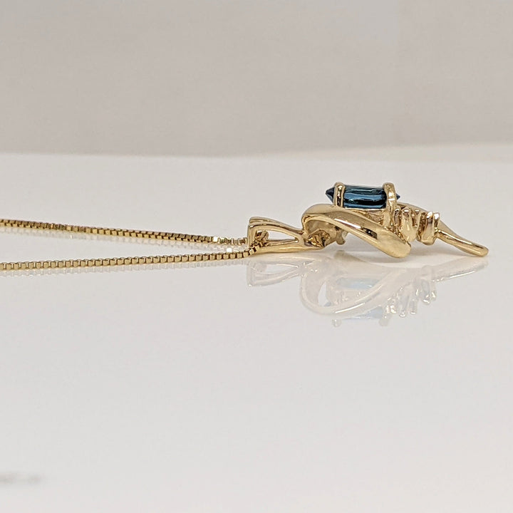 14K BLUE TOPAZ OVAL 4X6 WITH (2) MELEE FREE FORM ESTATE PENDANT & CHAIN 2.3 GRAMS