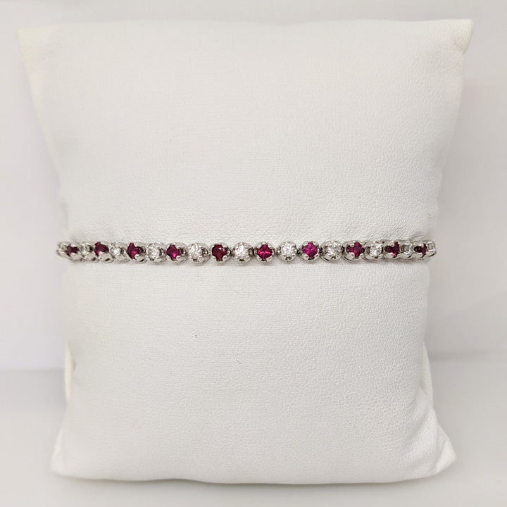 14K .51 CARAT TOTAL WEIGHT DIAMOND ROUND (11) .62 CARAT TOTAL WEIGHT RUBY ROUND (10) FLEXABLE ESTATE BRACELET 9.4 GRAMS