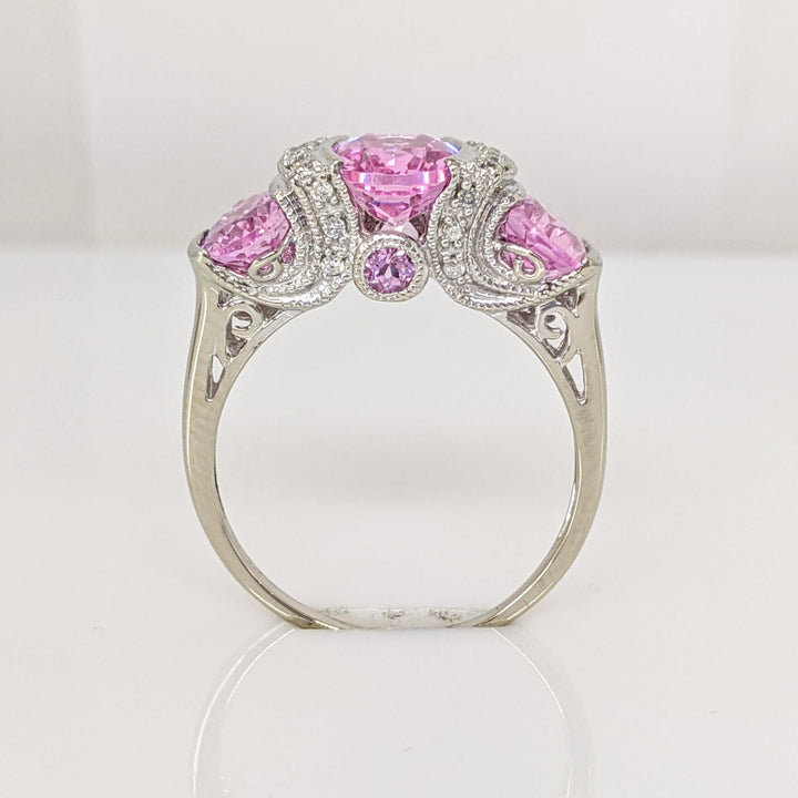 14K WHITE LAB-CREATED PINK SAPPHIRE OVAL (3) WTH .20 DIAMOND TOTAL WEIGHT HALF BEZEL ESTATE RING 4.2 GRAMS