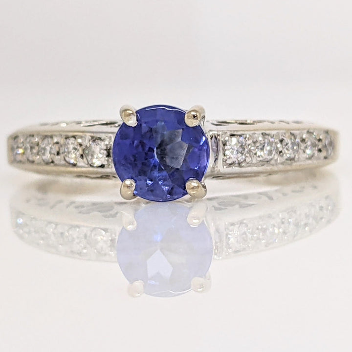 18K WHITE TANZANITE ROUND .65 CARAT TOTAL WITH .14 DIAMOND TOTAL WEIGHT (10) ROUND ESTATE RING 3.8 GRAMS