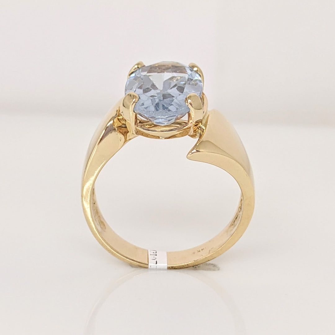 14K BLUE TOPAZ OVAL 9X14 BYPASS ESTATE RING 8.0 GRAMS