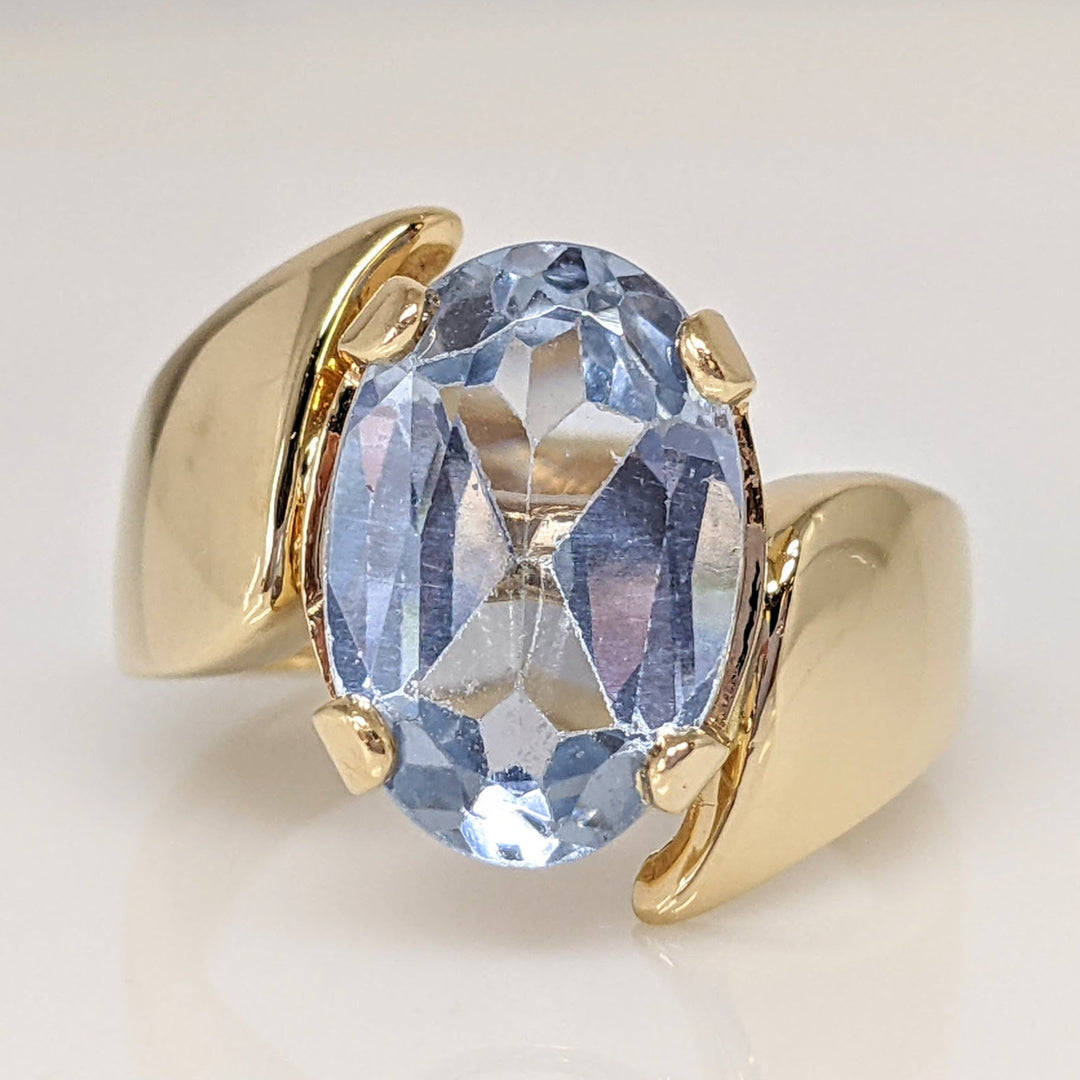 14K BLUE TOPAZ OVAL 9X14 BYPASS ESTATE RING 8.0 GRAMS