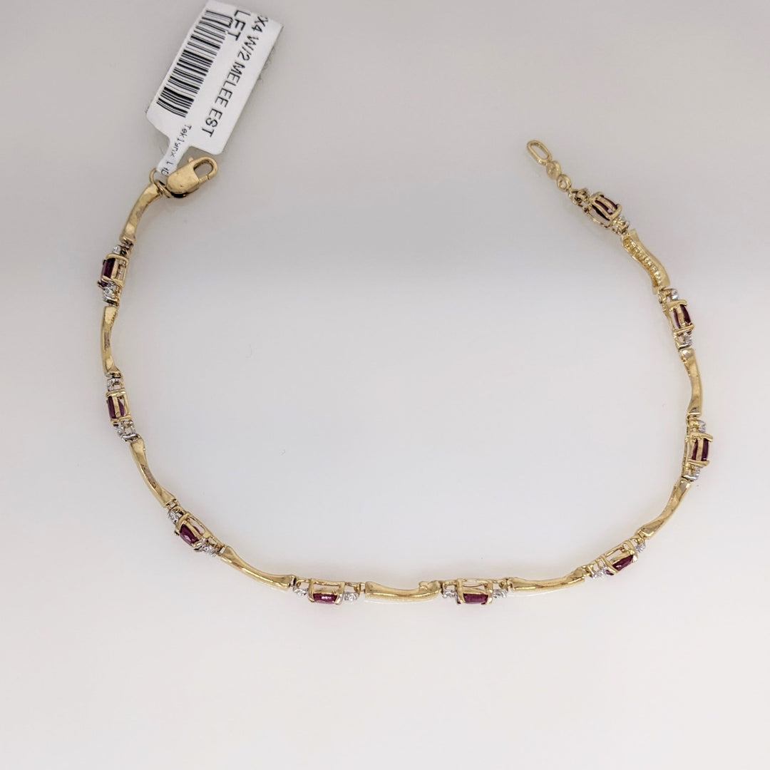 10K RUBY OVAL (9) 3X4 WITH (2) MELEE ESTATE BRACELET 3.5 GRAMS