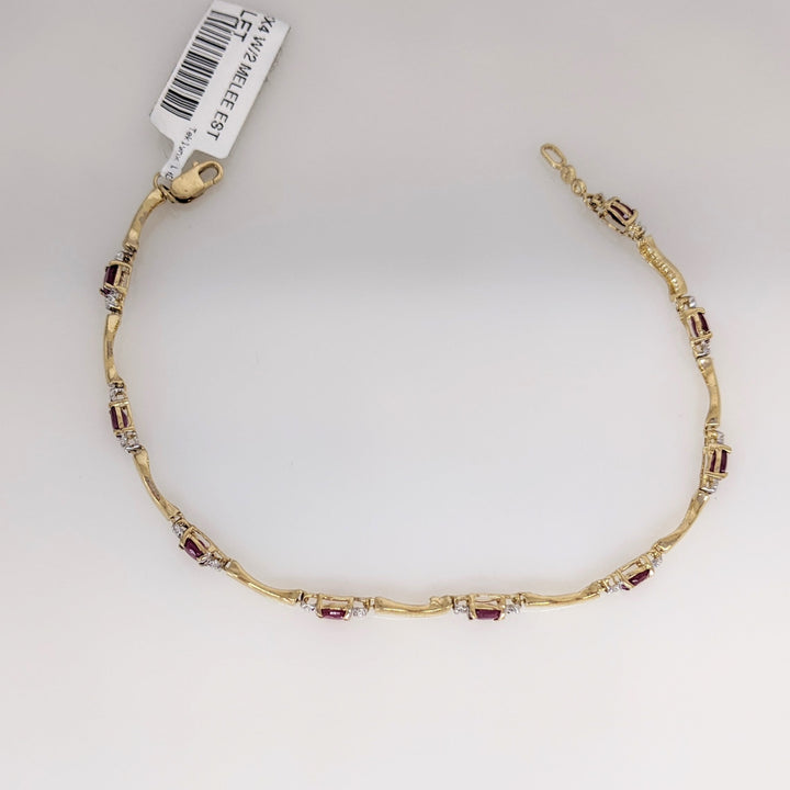 10K RUBY OVAL (9) 3X4 WITH (2) MELEE ESTATE BRACELET 3.5 GRAMS