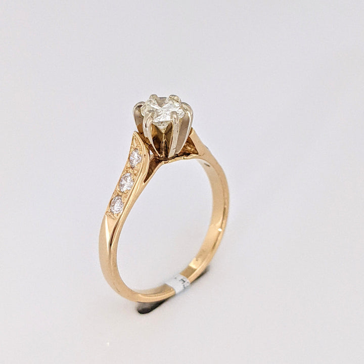 14K .62 CARAT TOTAL WEIGHT VS2 J DIAMOND OVAL WITH (6) ROUND MELEE ESTATE RING
