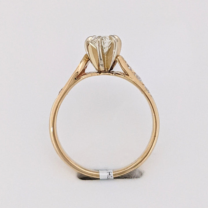 14K .62 CARAT TOTAL WEIGHT VS2 J DIAMOND OVAL WITH (6) ROUND MELEE ESTATE RING
