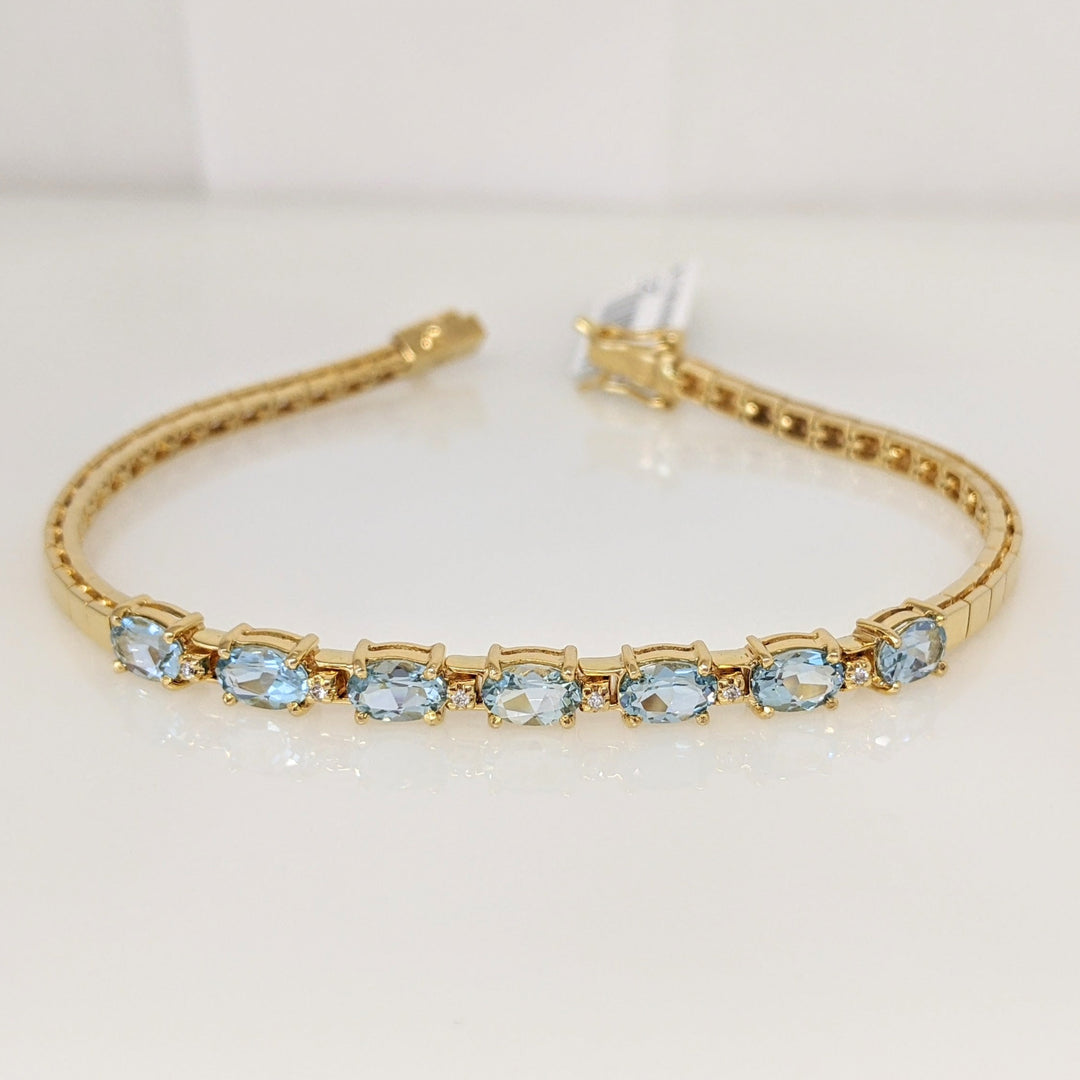 14K BLUE TOPAZ OVAL (7) 4X6 WITH (6) DIAMONDS ESTATE BRACELET 10.7 GRAMS