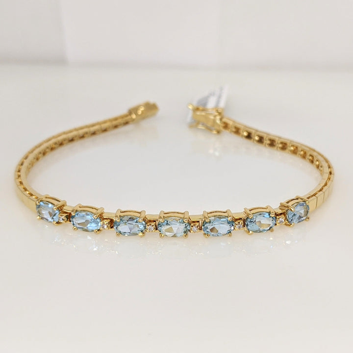 14K BLUE TOPAZ OVAL (7) 4X6 WITH (6) DIAMONDS ESTATE BRACELET 10.7 GRAMS