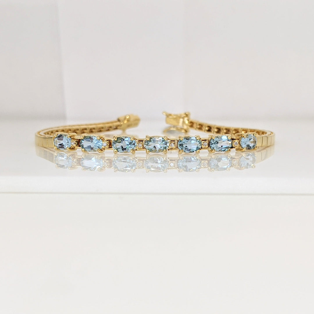 14K BLUE TOPAZ OVAL (7) 4X6 WITH (6) DIAMONDS ESTATE BRACELET 10.7 GRAMS