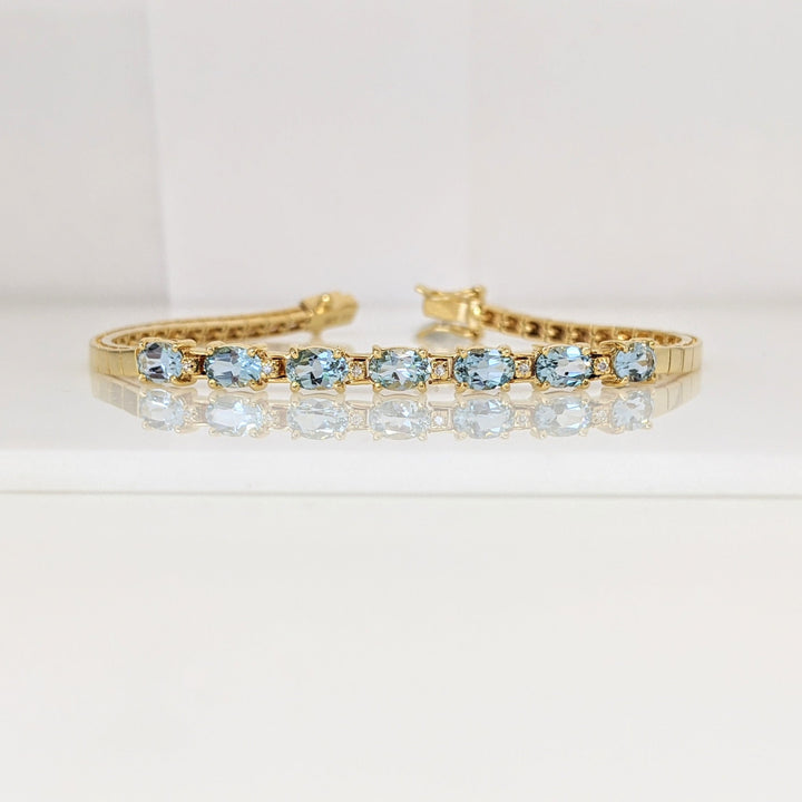 14K BLUE TOPAZ OVAL (7) 4X6 WITH (6) DIAMONDS ESTATE BRACELET 10.7 GRAMS