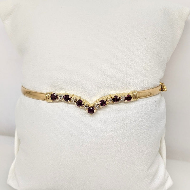 14K RUBY ROUND (7) 2.8-3MM WITH (6) MELEE ESTATE V-BANGLE 6.0 GRAMS