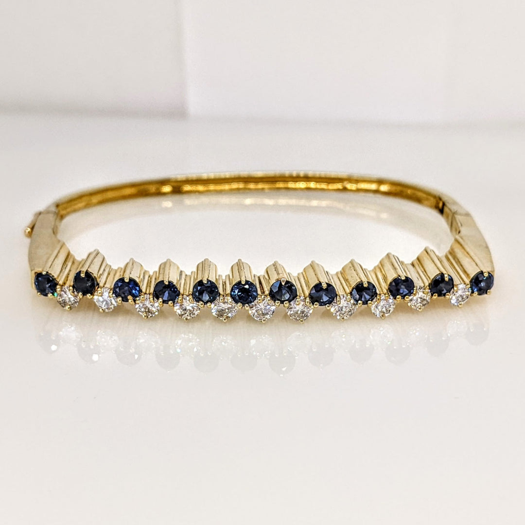 14K 1.10 CARAT TOTAL WEIGHT VS2 J DIAMOND ROUND (10) 1.00CTW SAPPHIRE ROUND (10) ESTATE BANGLE 14.6 GRAMS