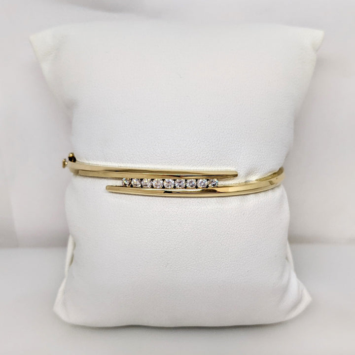 14K .54 CARAT TOTAL WEIGHT VS2 J DIAMOND ROUND (9) BYPASS CHANNEL SET ESTATE BANGLE 14.4 GRAMS