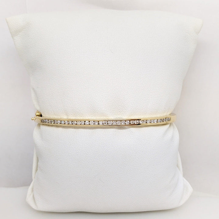 14K .70 CARAT TOTAL WEIGHT I1 I DIAMOND ROUND (35) CHANNEL SET ESTATE BANGLE 15.8 GRAMS